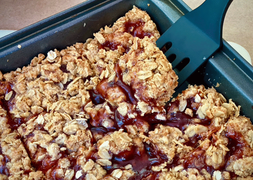 Strawberry jam bars in a baking pan