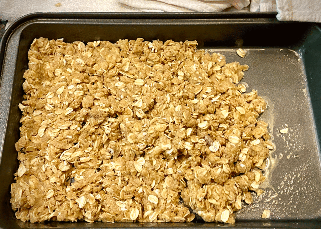 Oatmeal mixture in a baking pan
