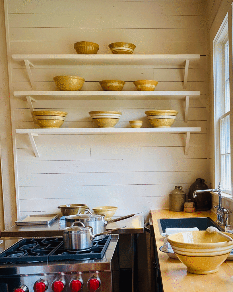 White wall with bowls in kitchen | Photo by Lucy Mercer | A Cook and Her Books