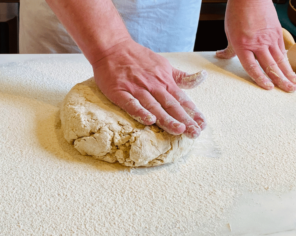 Gently patting biscuit dough | Photo by Lucy Mercer/A Cook and Her Books