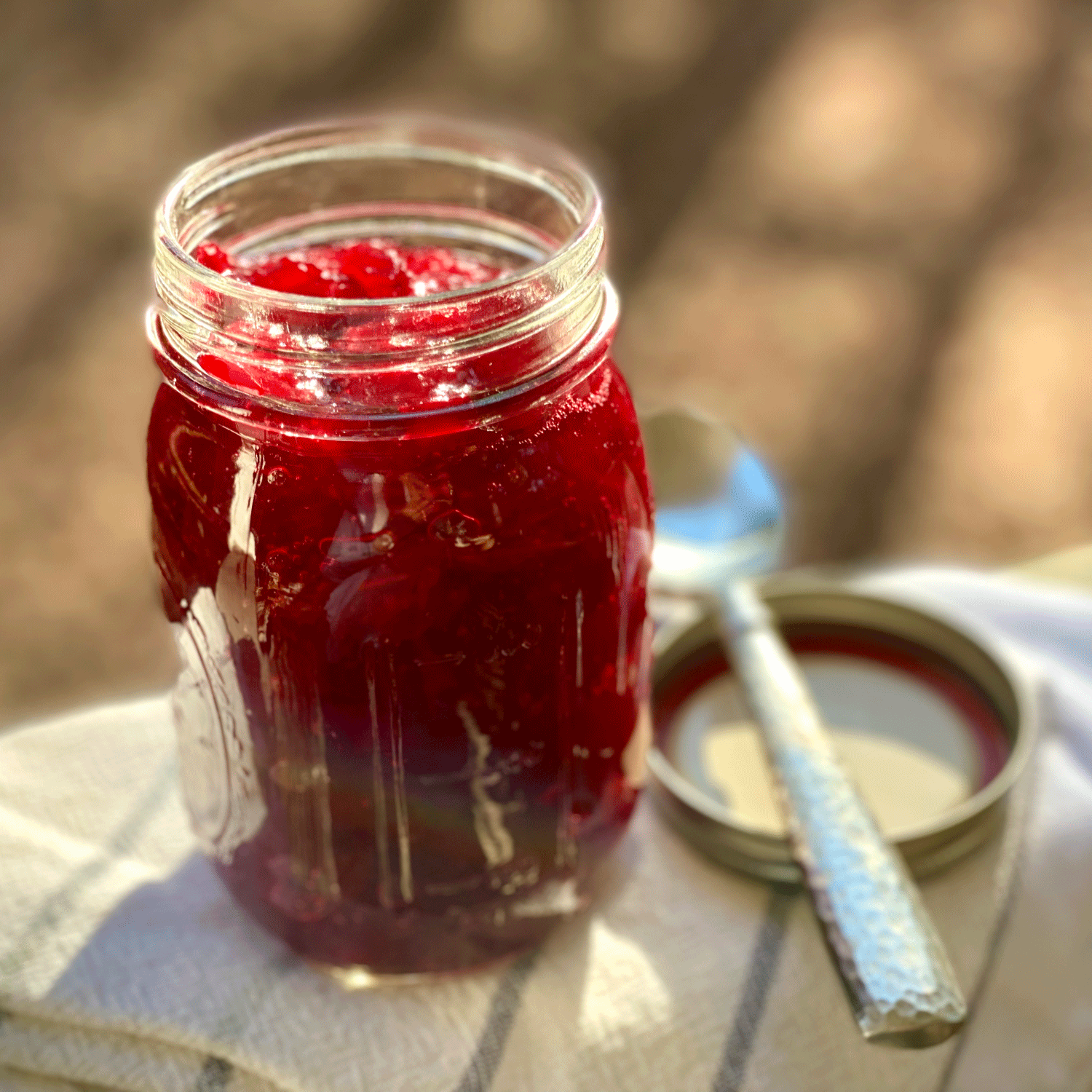 Cranberry sauce in jar | Photo by Lucy Mercer | A Cook and Her Books