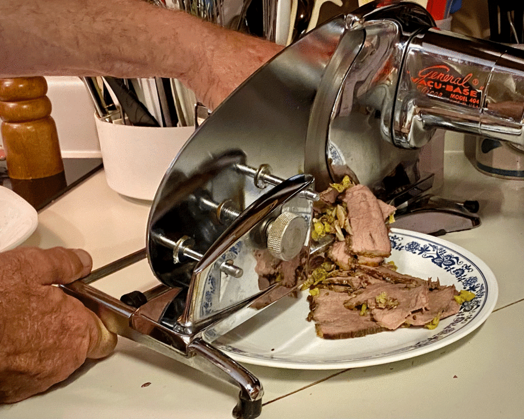 Chef slices roast beef | Photo by Lucy Mercer | A Cook and Her Books