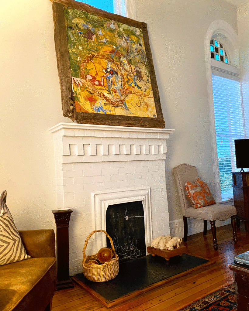 Painting over fireplace | Photo by Lucy Mercer | A Cook and Her Books