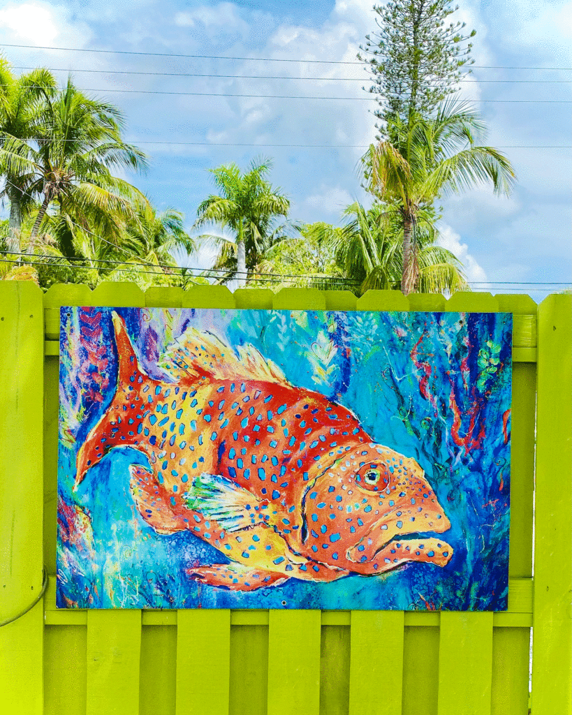 Fish painting on fence | Photo by Lucy Mercer/A Cook and Her Books