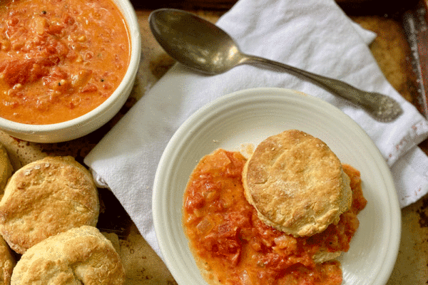 A plate of biscuits with tomato gravy