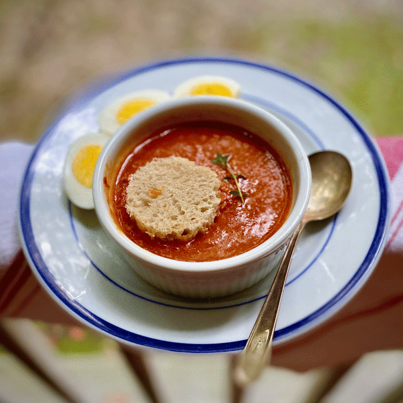 Tomato soup on a white plate