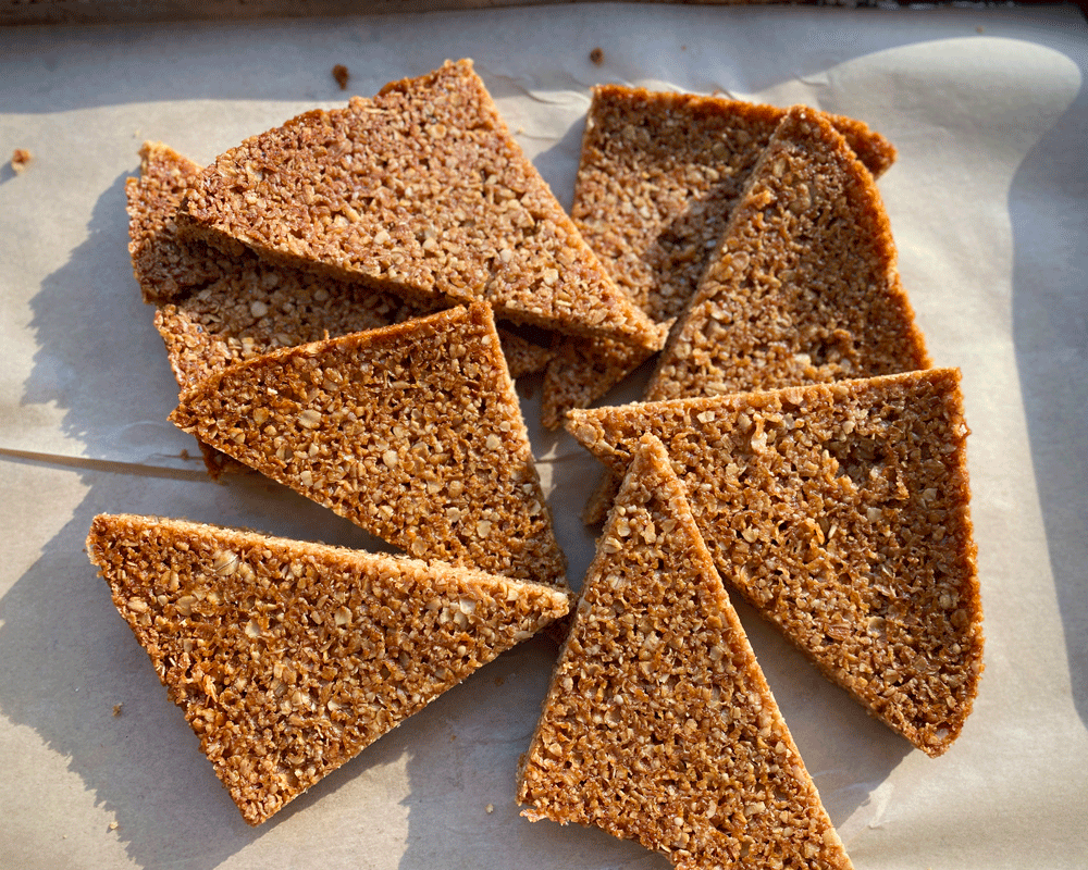 Golden brown oatmeal flapjacks in triangle shapes