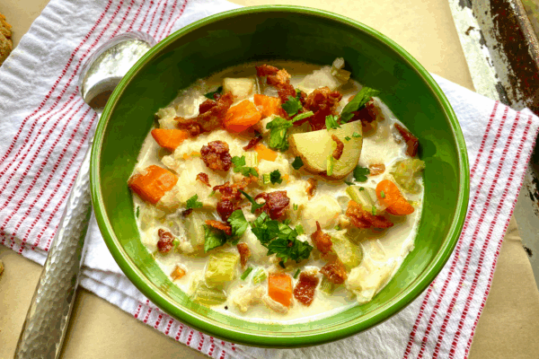 Seafood chowder in a green bowl