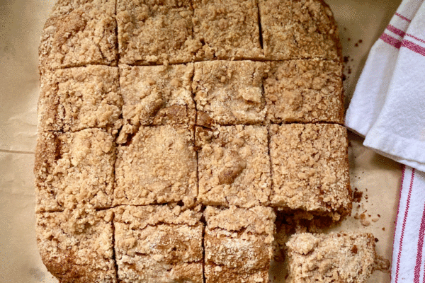 Banana Cake with crumb topping cut into squares