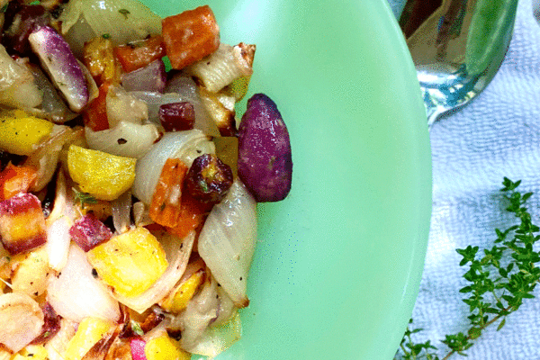 Roasted root vegetables in a glass bowl