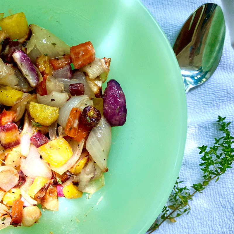 Roasted root vegetables in a glass bowl