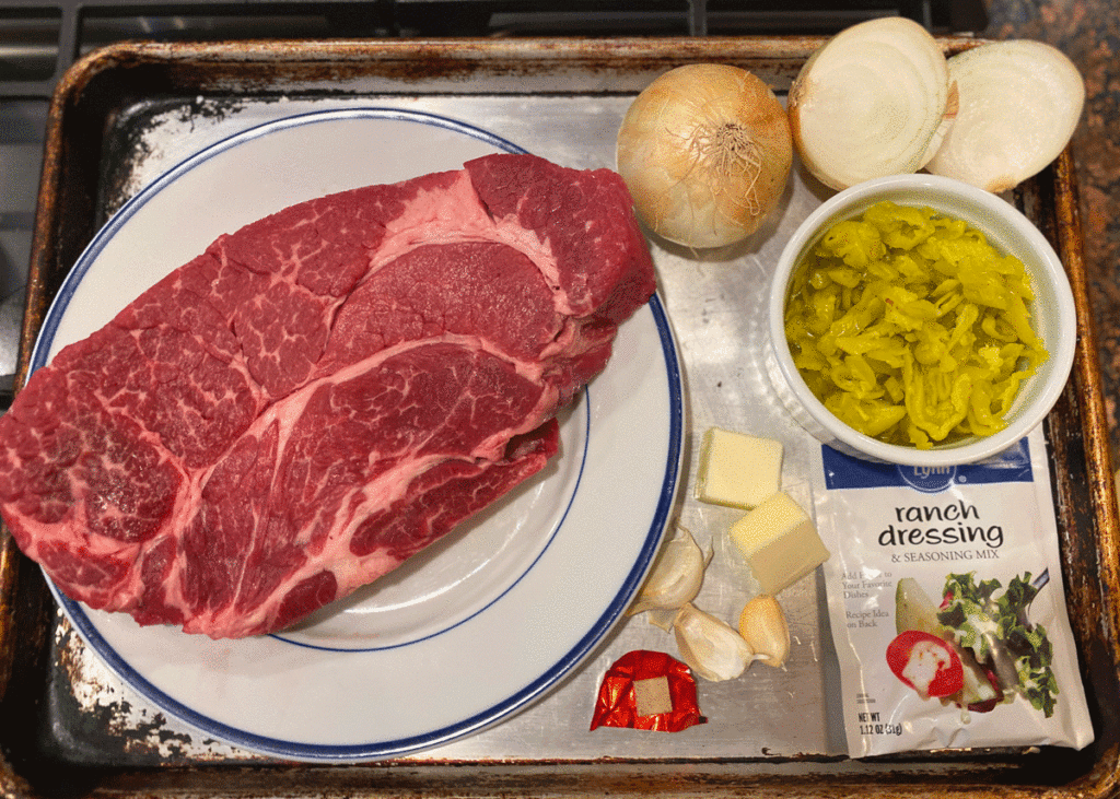 Chuck roast and ingredients for Mississippi pot roast