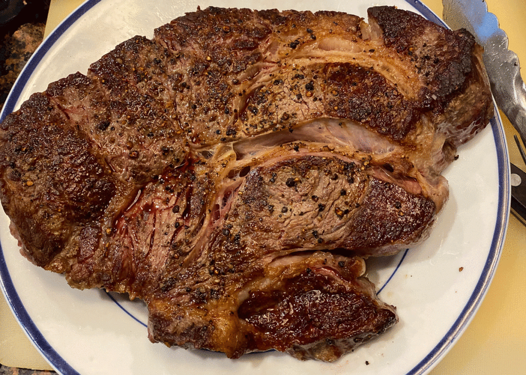 Browned chuck roast on a white plate