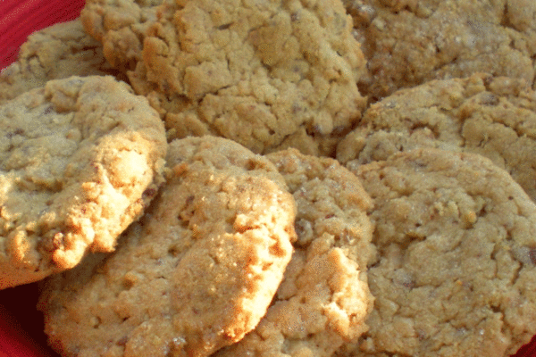 Buttery 100 cookies on a red plate