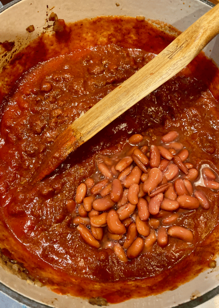 Beans added to ground beef mixture