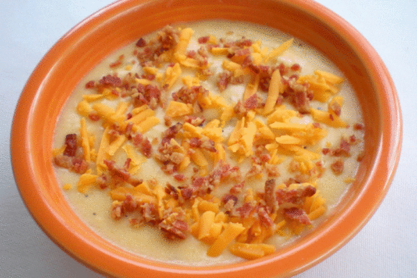 Baked potato soup with Cheddar cheese and bacon