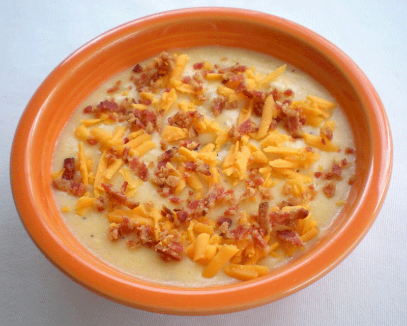 Baked potato soup with Cheddar cheese and bacon