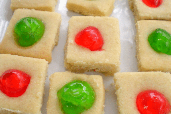 Shortbread squares with red and green candied cherries