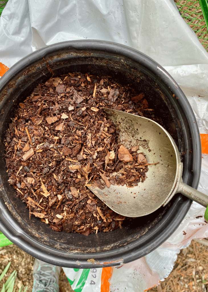 A scoopful of soil conditioner