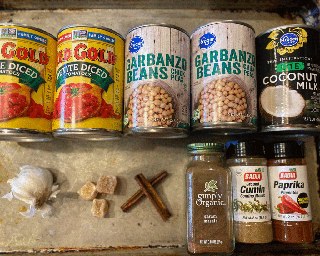 Ingredients for chicpea coconut curry on a tray