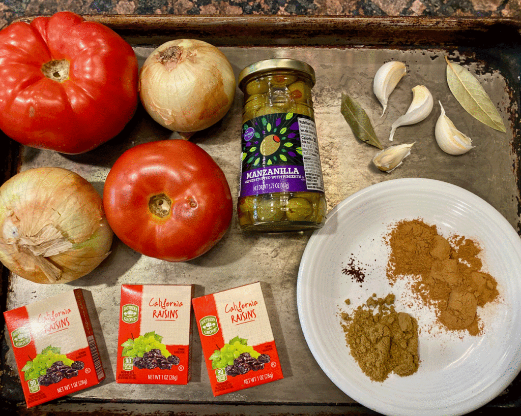 Ingredients for picadillo on a tray