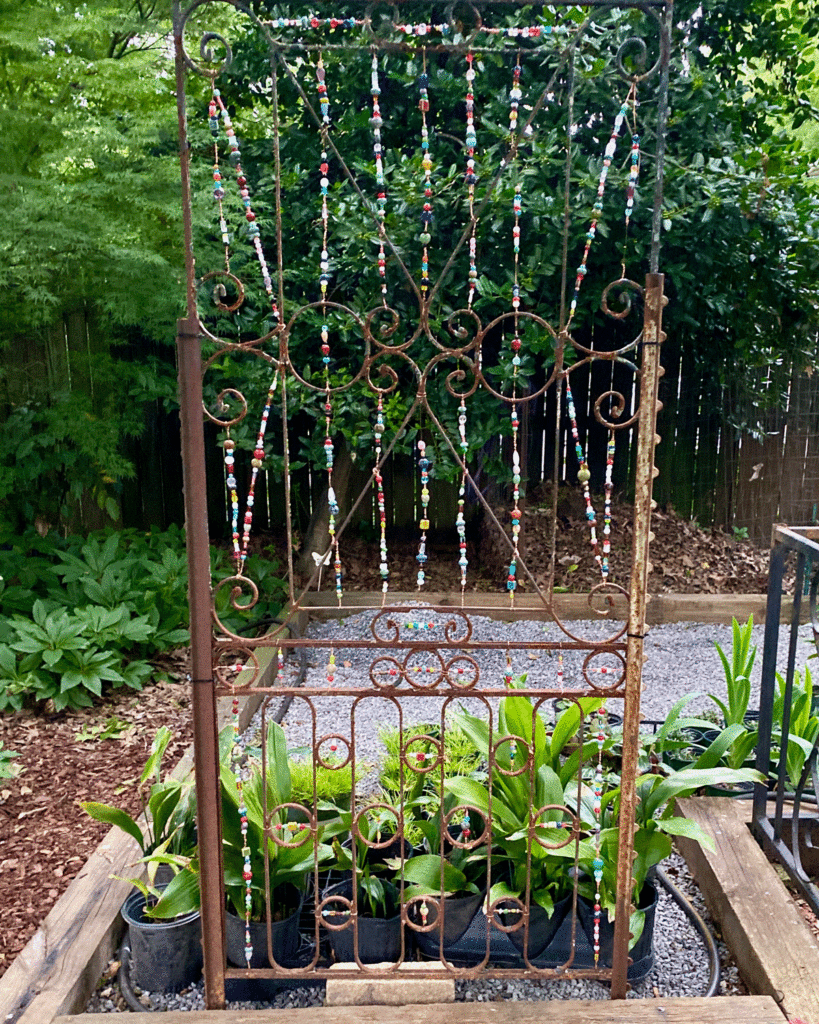 A metal frame with glass bead strings